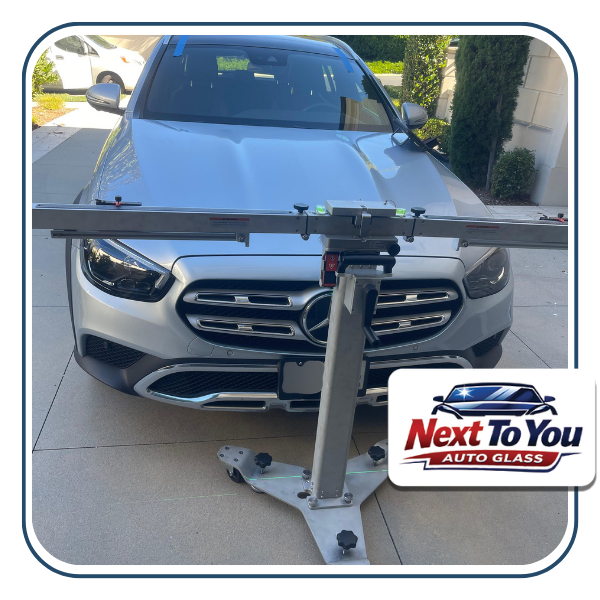 Driver checking new glass after best windshield replacement in Santa Ana, CA