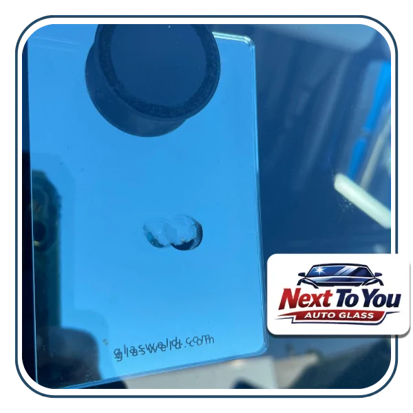 Mobile auto glass in Santa Ana CA technician replacing windshield at home